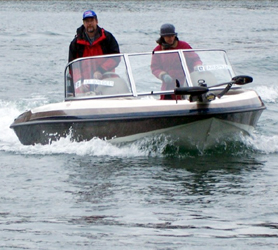 Al & Beth Denninger on their way to tend a customer's dock - Point 12 Dock Tending Service